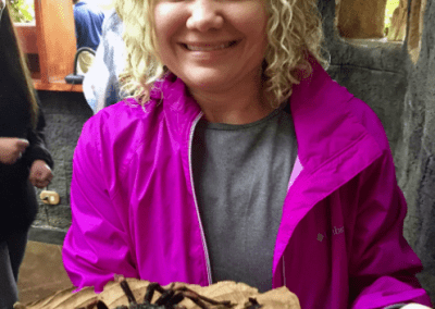 Erica Croft holds a tarantula in Costa Rica.