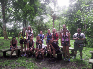 The student group to Costa Rica prepares to go zip lining.